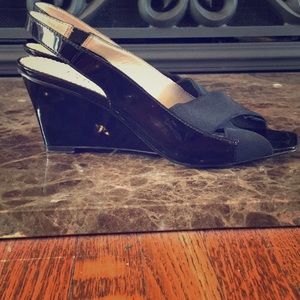 Black patent leather sling backs